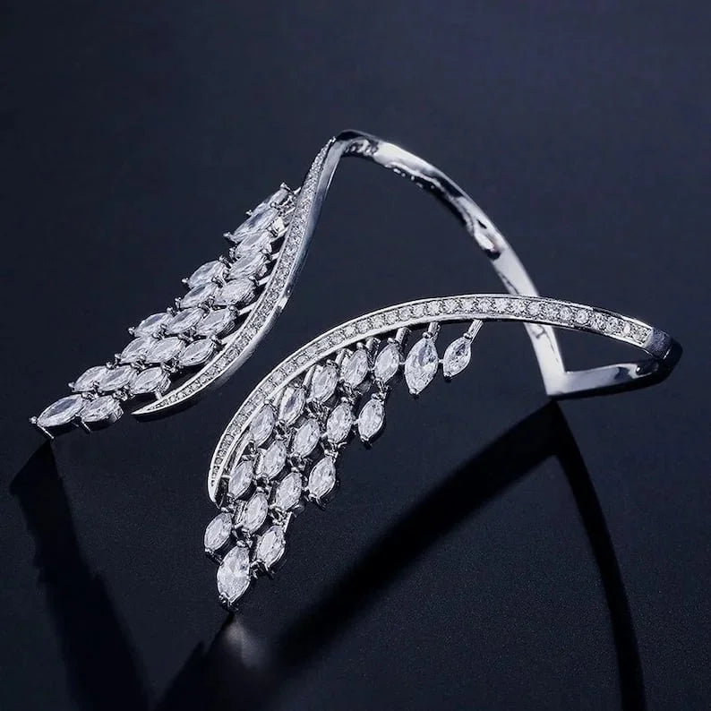 Evita – Armband und Ring mit Engelsflügeln