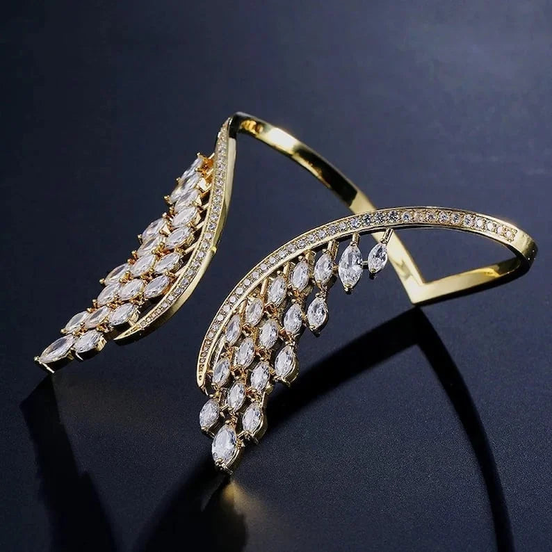 Evita – Armband und Ring mit Engelsflügeln