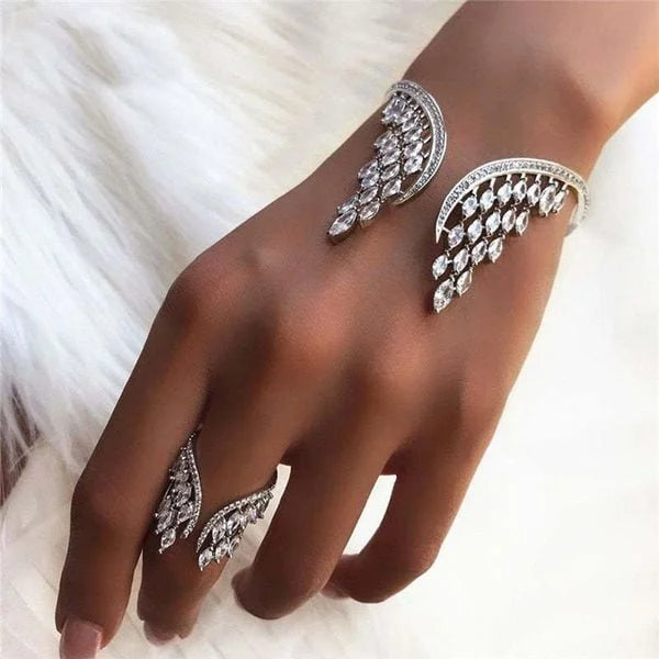 Evita – Armband und Ring mit Engelsflügeln