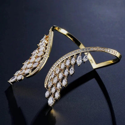Evita – Armband und Ring mit Engelsflügeln